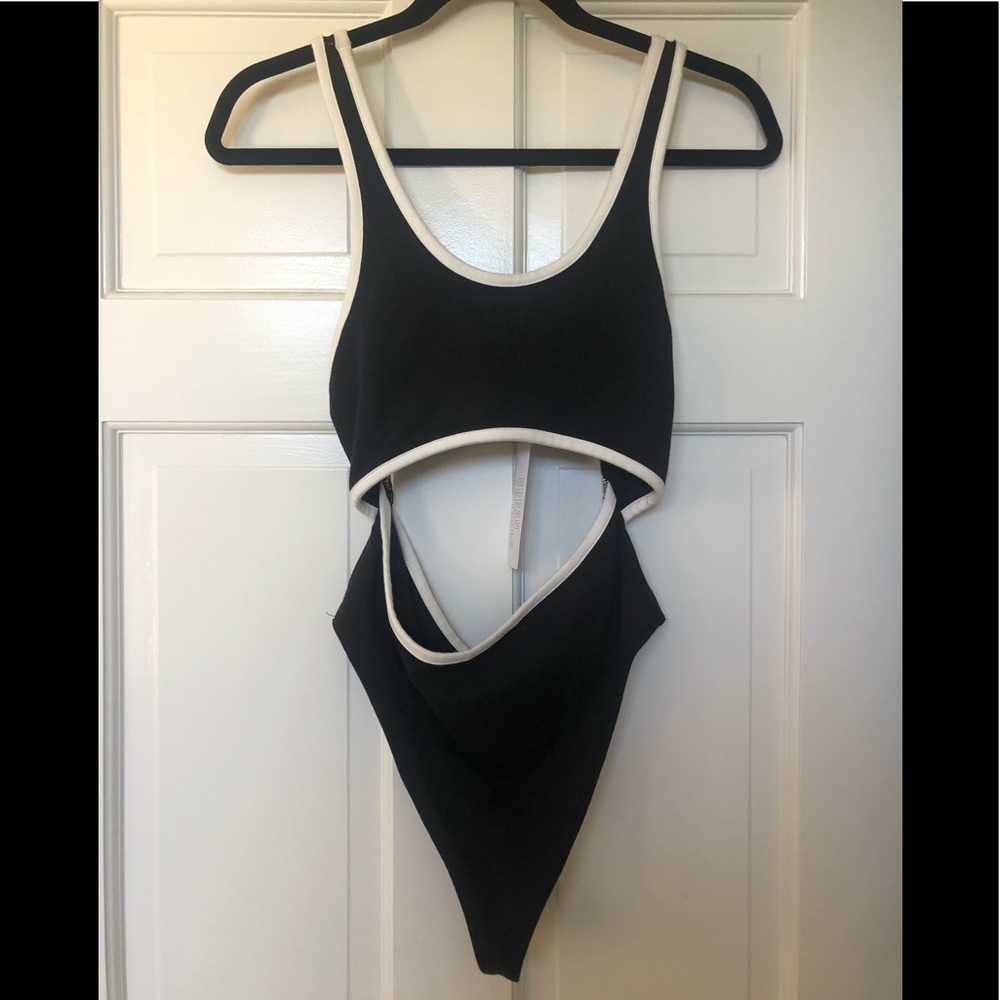 Out from under sporty body suit